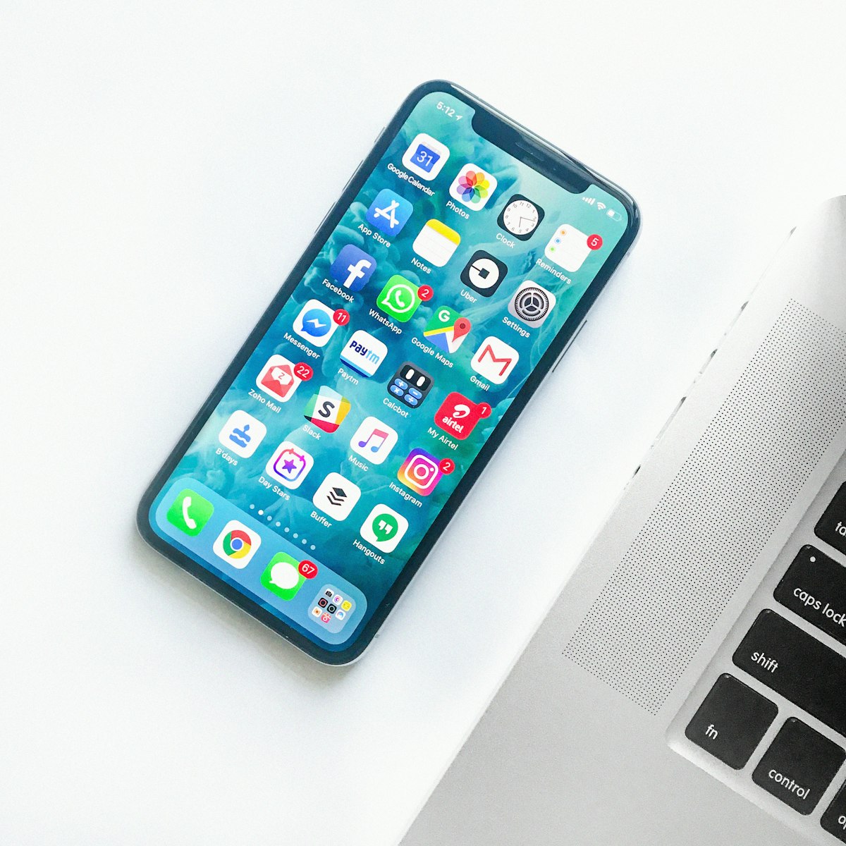 A modern smartphone held in one hand